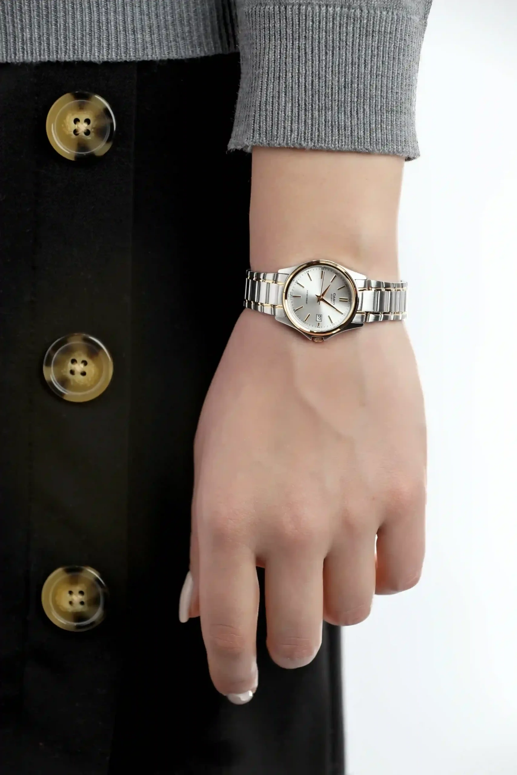 Elegant Casio women’s watch with gold and silver bracelet