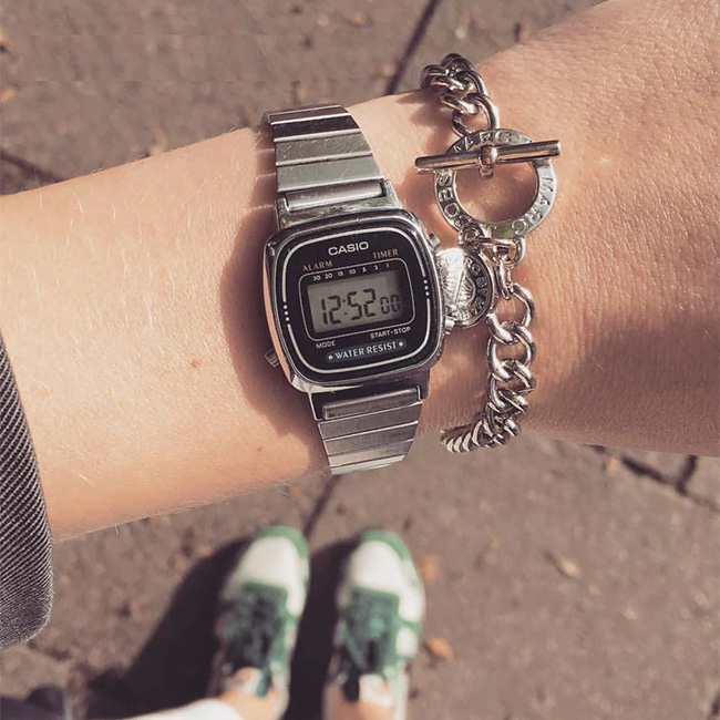 Close-up of Casio LA670WA-1DF digital display and adjustable strap