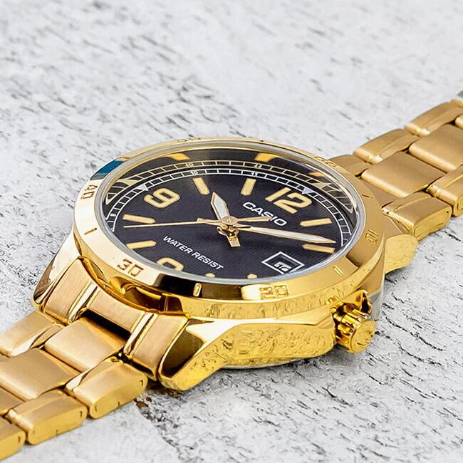 Casio gold watch side profile showing clasp and bracelet links