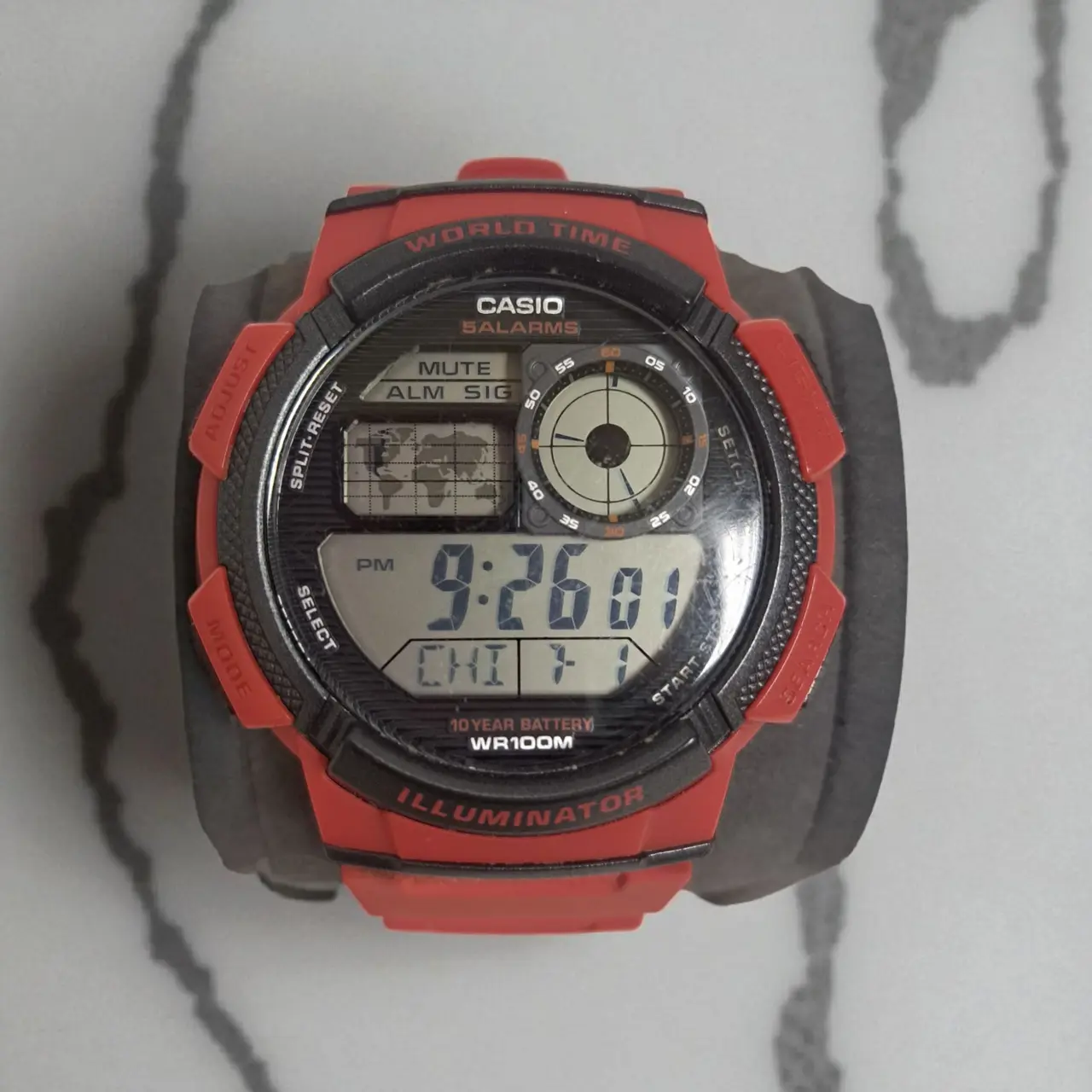 Top view of AE-1000W-4AVDF showing world map and digital features