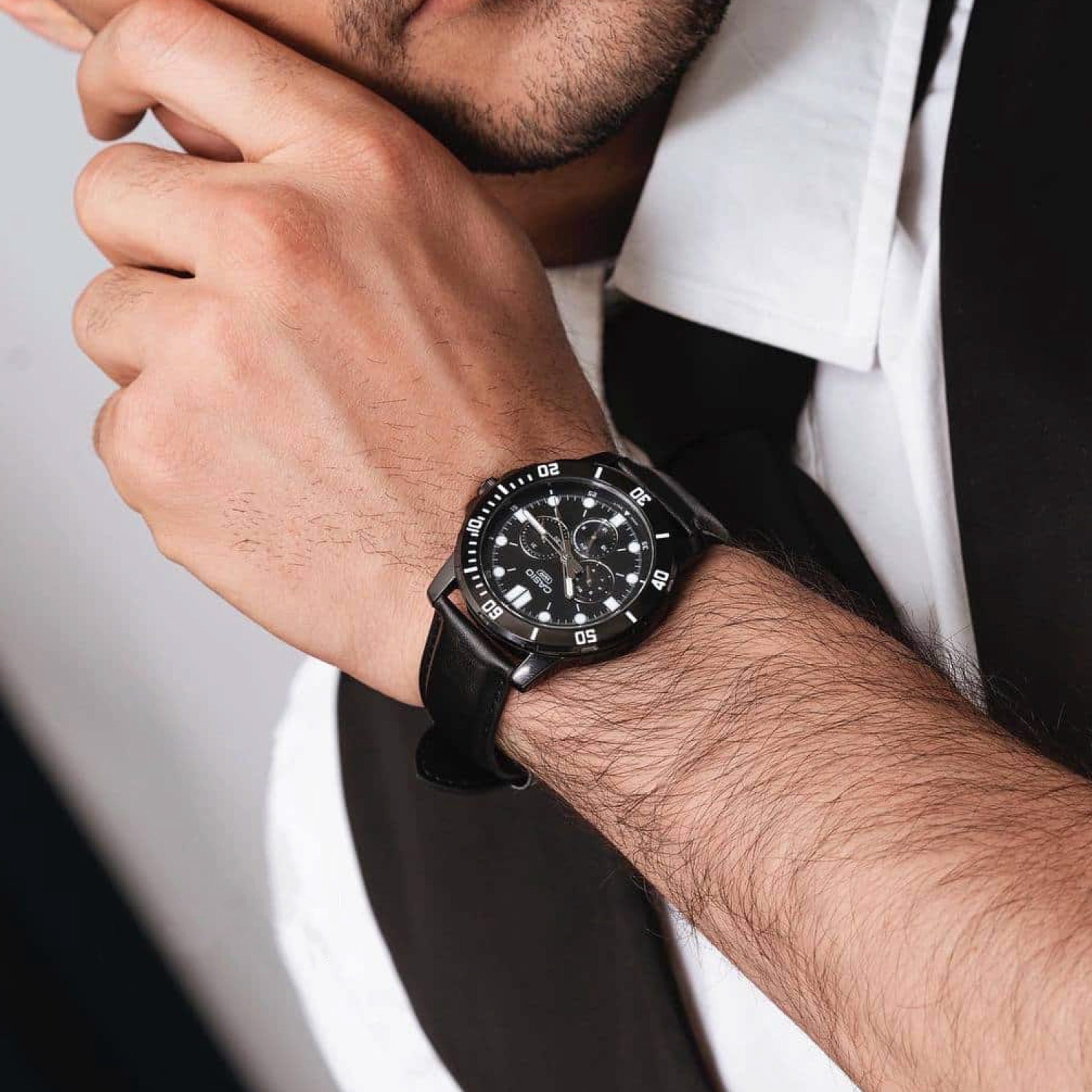 Close-up of MTP-VD300BL-1EUDF black dial and silver detailing