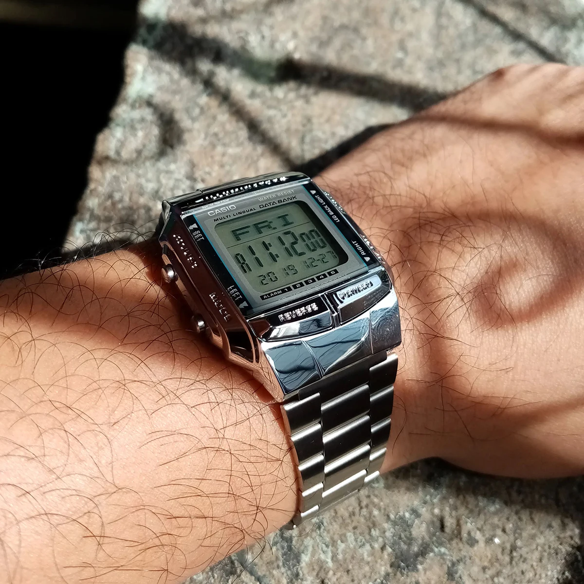 Front display of Casio digital watch showing time and date
