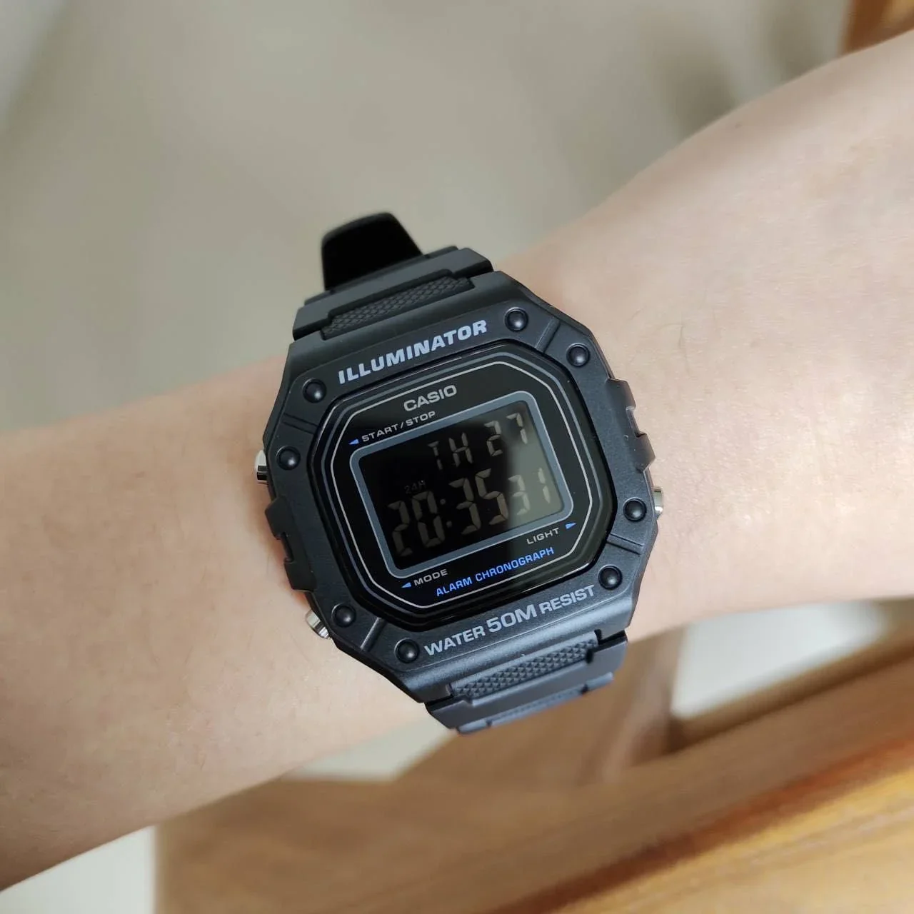 Side profile of Casio W-218H digital with resin strap