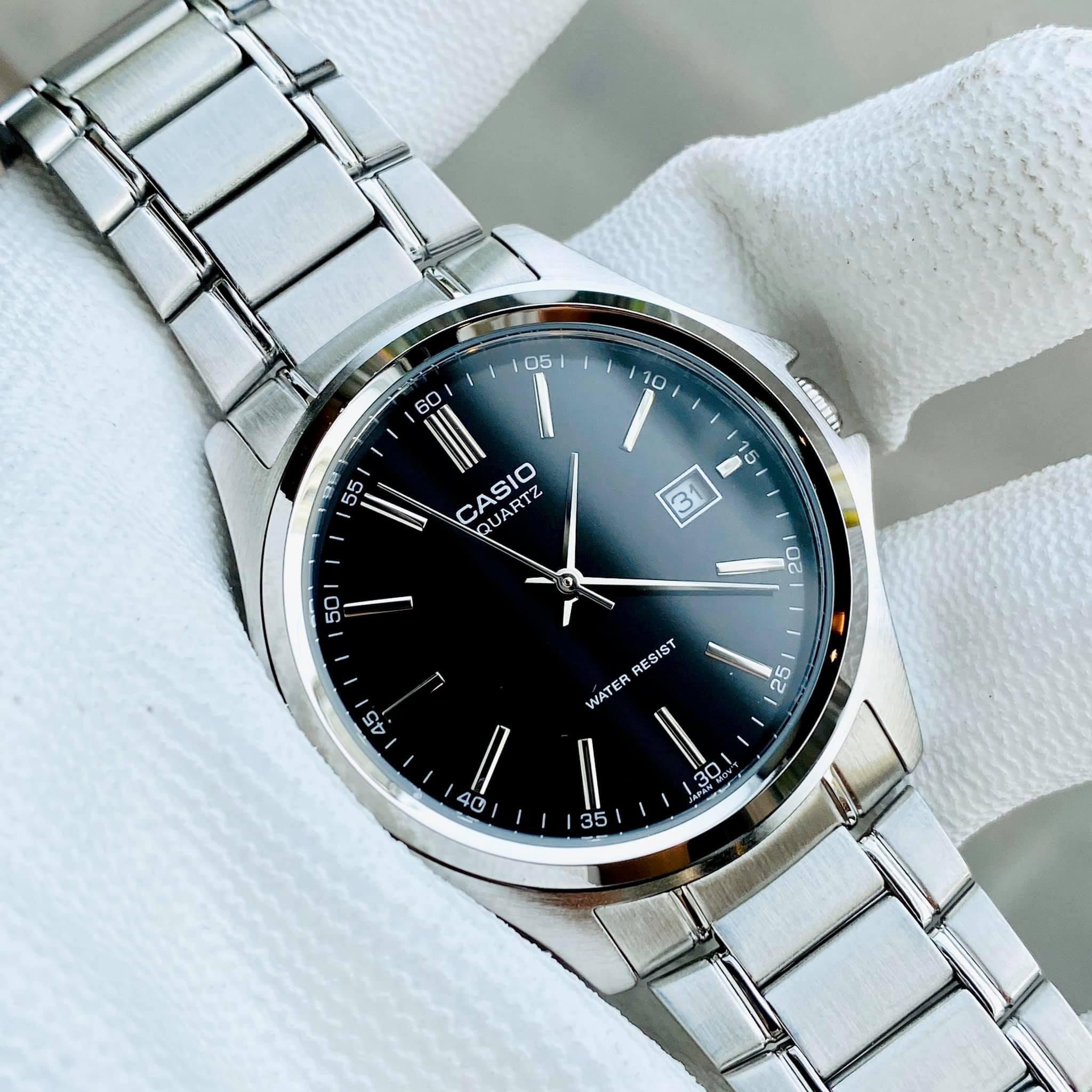 Side view of stainless steel Casio MTP-1183A-1ADF watch