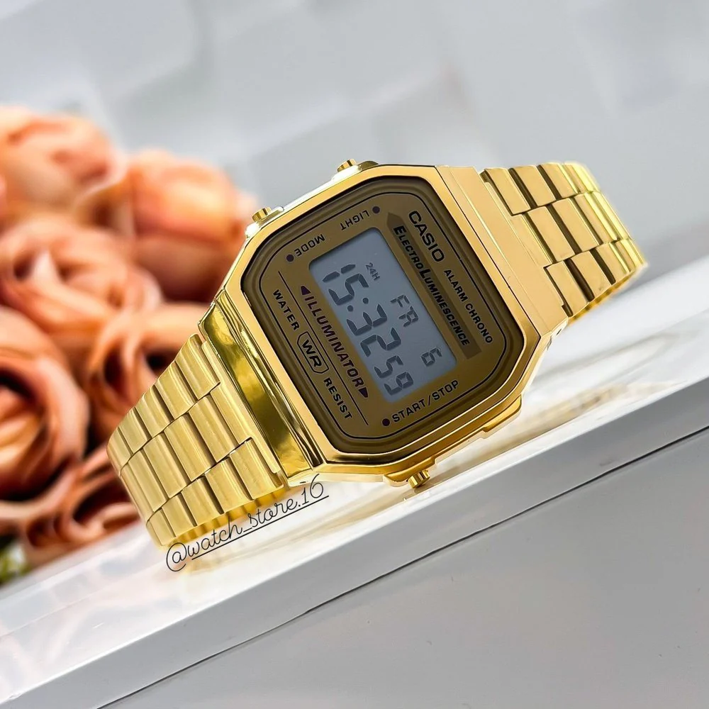 Side view of vintage Casio A168WG watch in gold finish