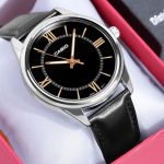 Close-up of gold-tone markers on black Casio dial
