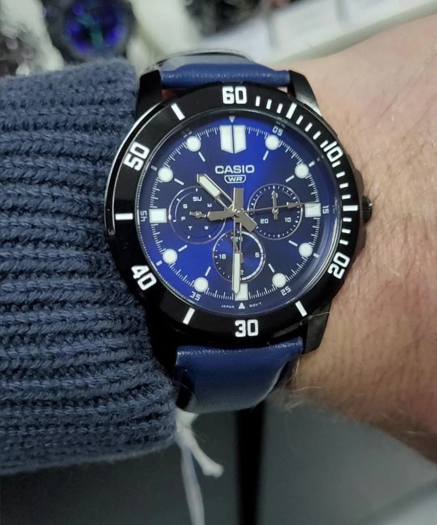 Side profile view of Casio men’s analog chronograph watch