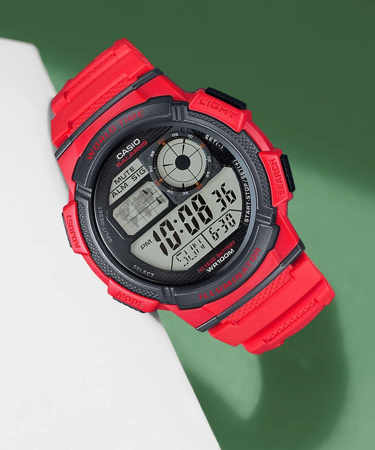 Side angle of sporty Casio watch with rugged orange build
