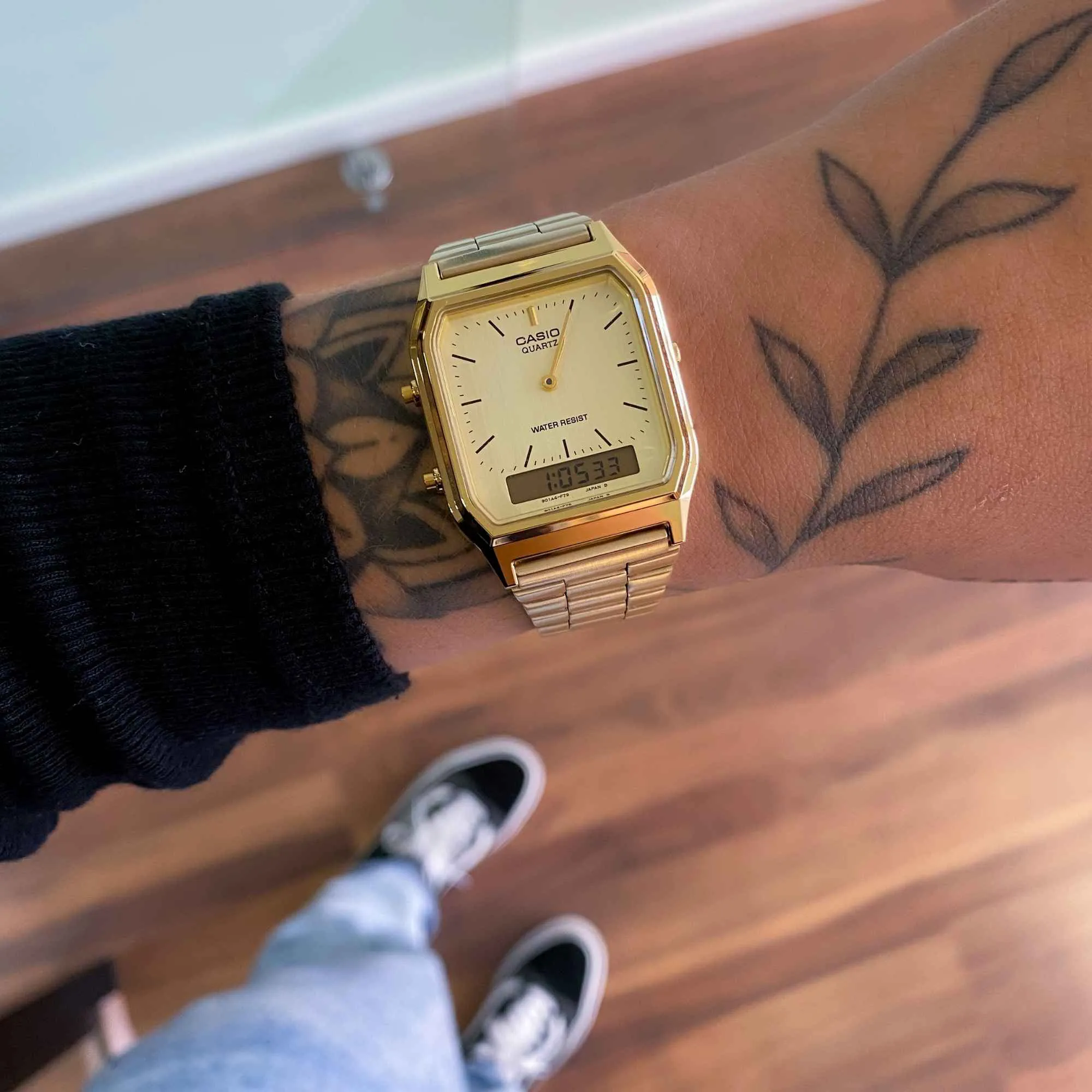 Close-up of dual time display with champagne gold dial