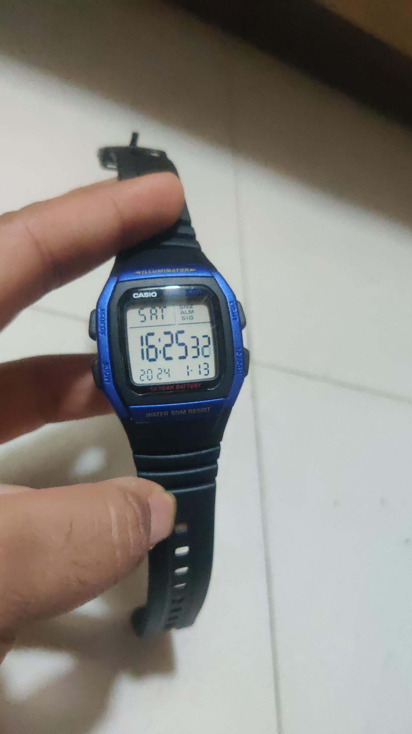 Close-up of stopwatch and alarm functions on screen