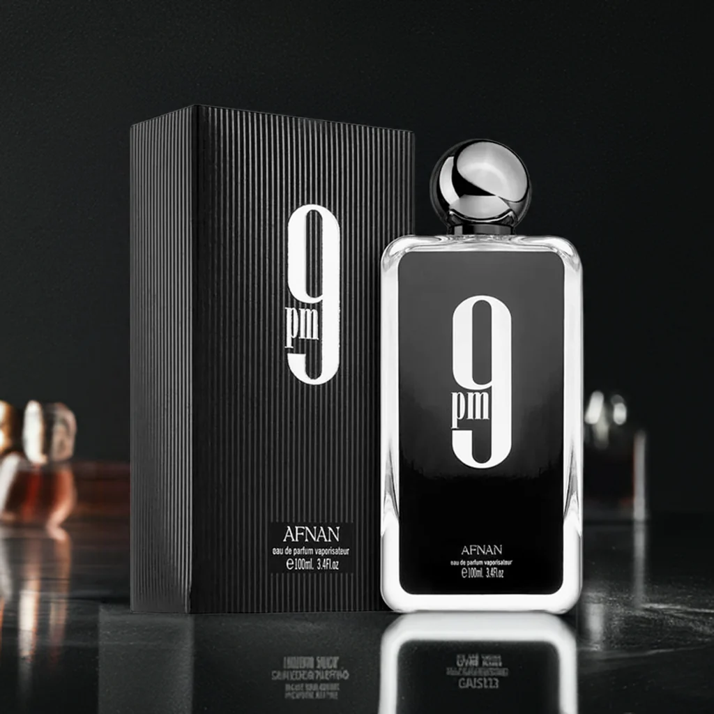 Close-up of Afnan 9PM perfume bottle cap and logo